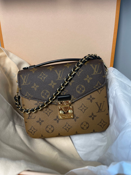 LOUIS VUITTON REVERSE MONOGRAM BACKPACK