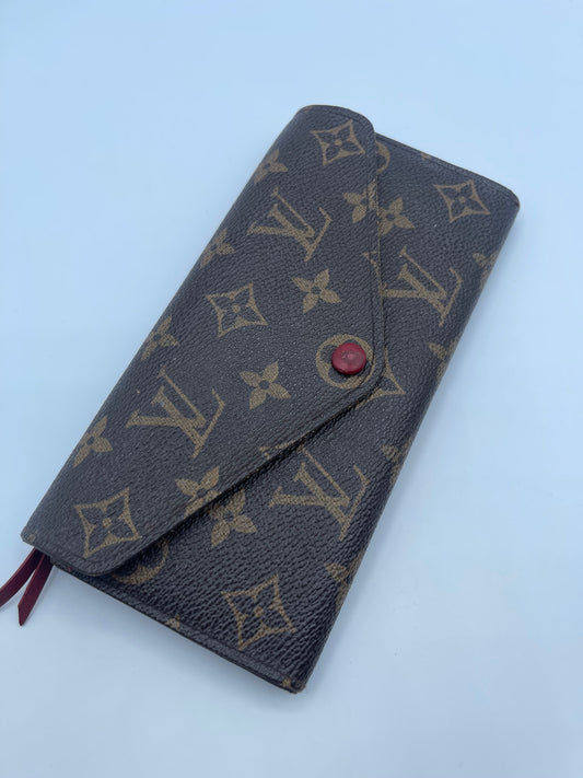 LOUIS VUITTON BI FOLD WALLET MONOGRAM RED INTERIOR