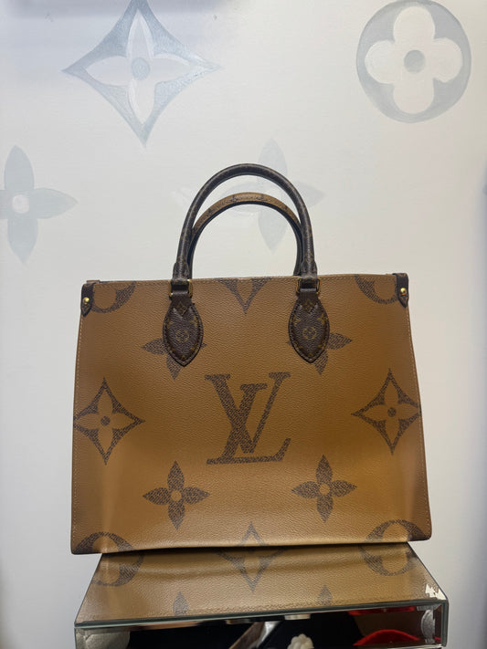 LOUIS VUITTON ON THE GO MM REVERSE MONOGRAM