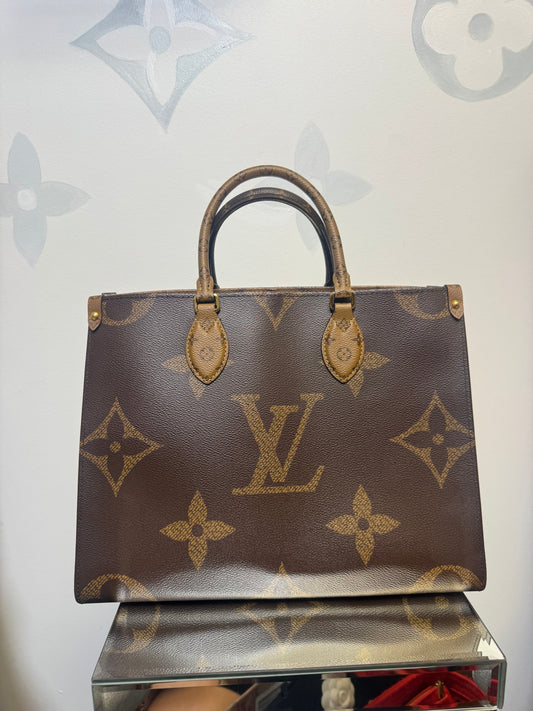 LOUIS VUITTON ON THE GO MM REVERSE MONOGRAM