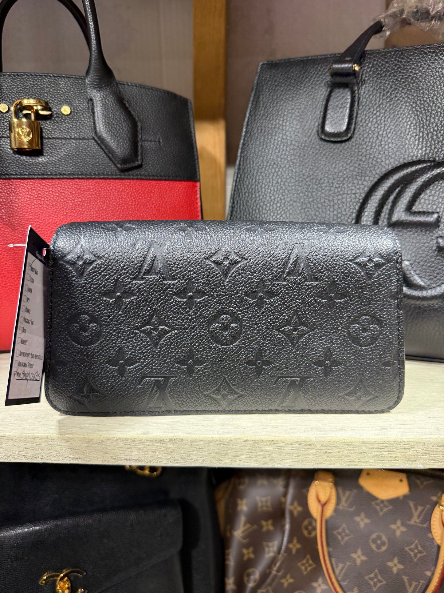 LOUIS VUITTON POCHETTE EAST WEST