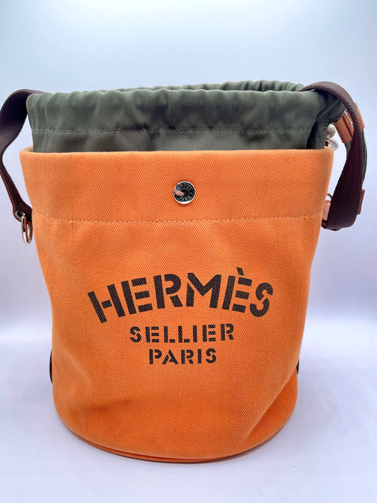 ORANGE HERMES CANVAS BUCKET BAG