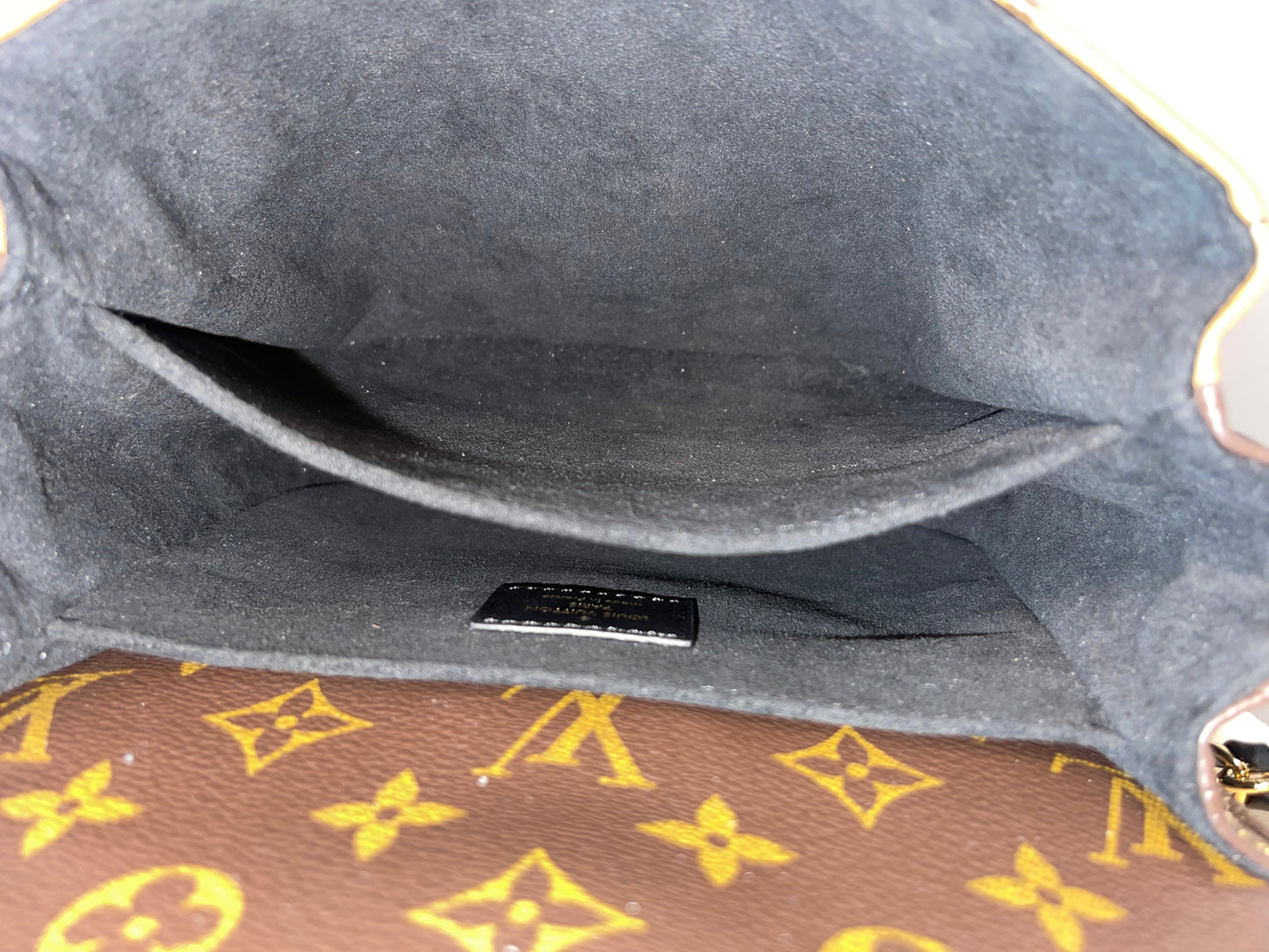 LOUIS VUITTON REVERSE MONOGRAM BACKPACK