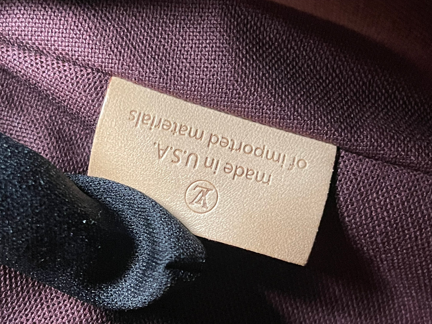 LOUIS VUITTON MM TURNNE