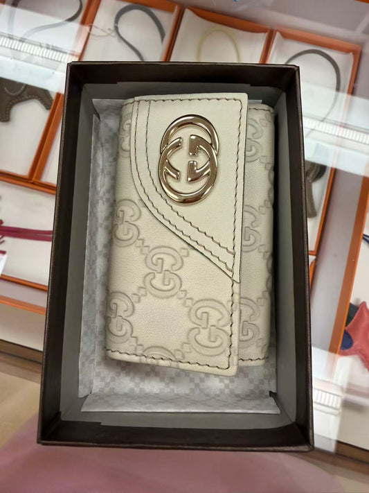 GUCCI GG SIGNATURE COMPACT WALLET