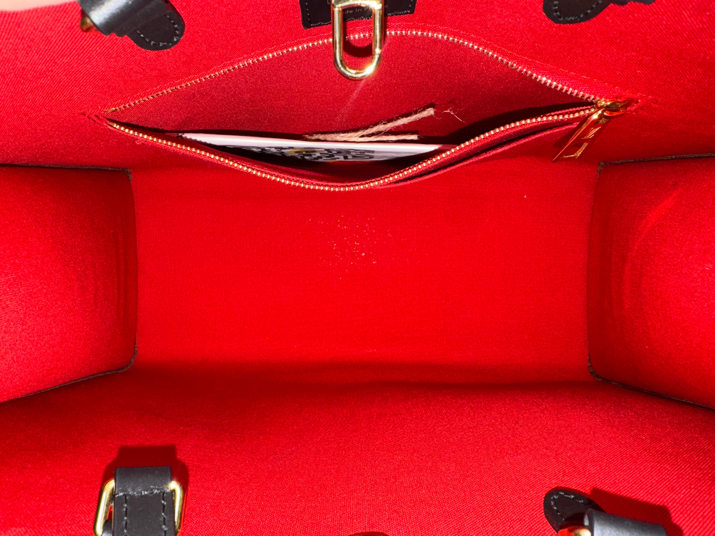 LOUIS VUITTON ON THE GO MM REVERSE MONOGRAM