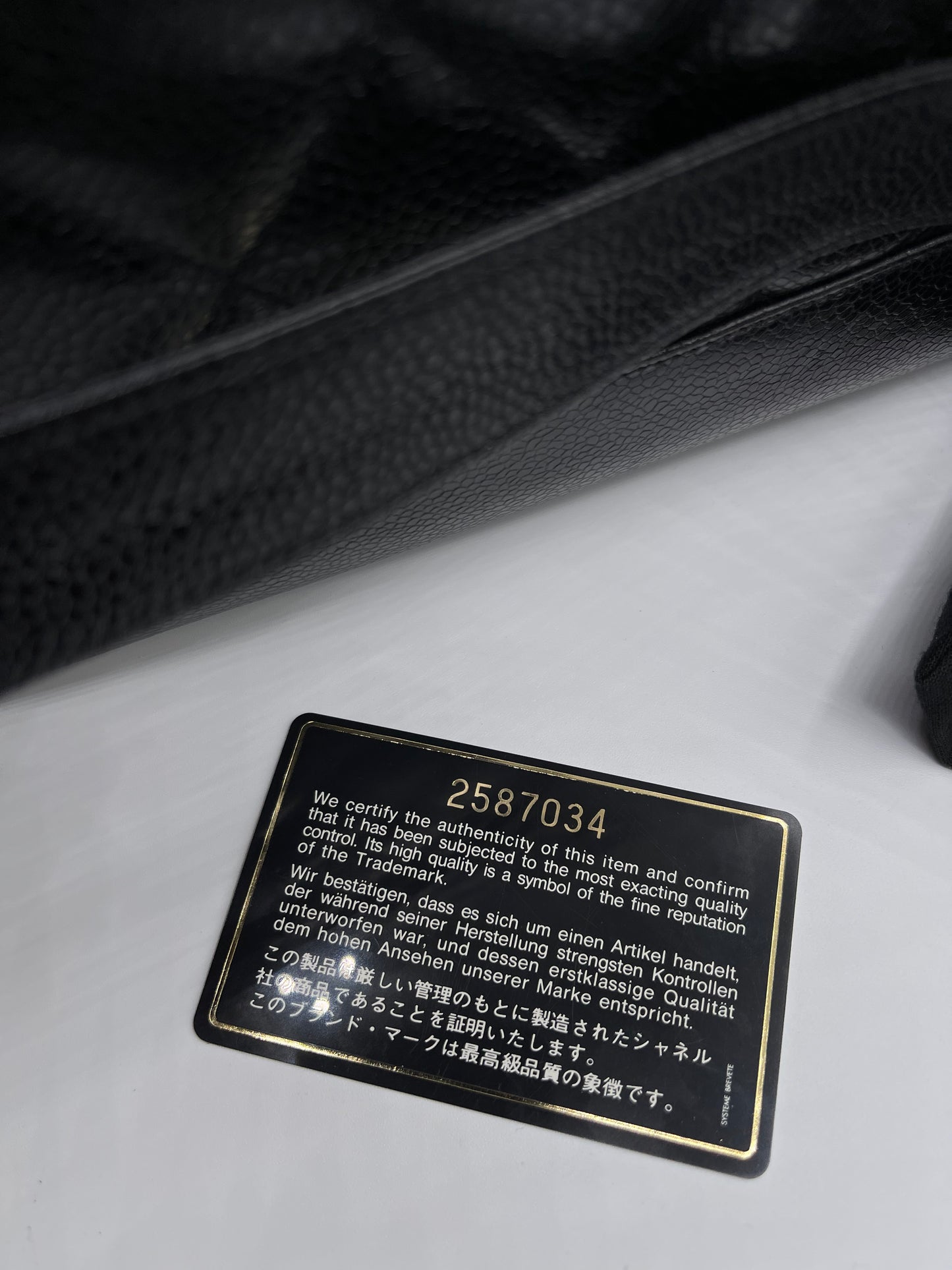 BLACK CHANEL CAVIAR SHOULDER BAG WITH GOLD HARDWARE LONG STRAPS